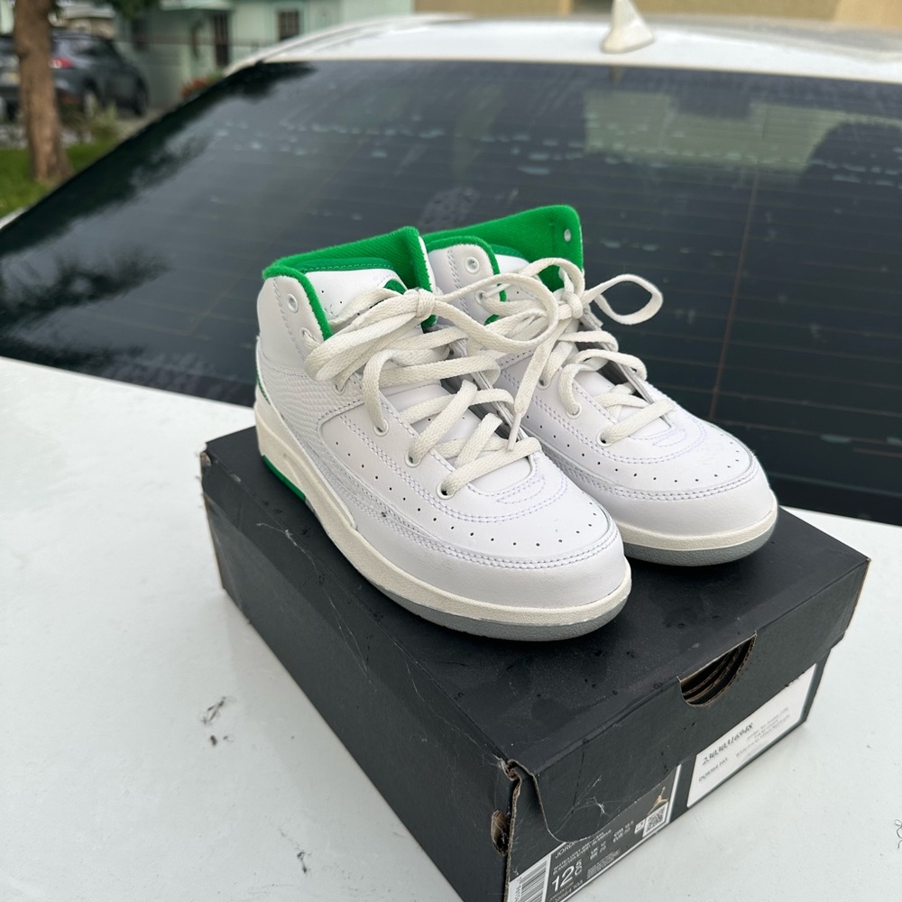 White and green Jordan 2s